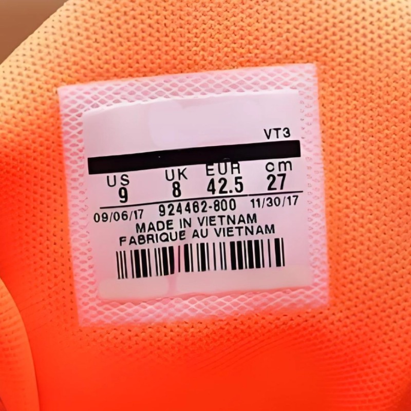 Double layer composite TPU tongue label applied on shoe made using low temperature TPU hot melt adhesive film and high temperature TPU film supplied by GREEN TPU providing durable water washable material for athletic and casual footwear